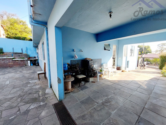 Imagem Imóvel com 4 Quartos à Venda,  em Vila Nova - Porto Alegre