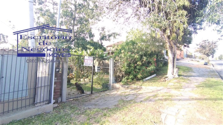 Imagem Casa com 3 Quartos à Venda, 200 m² em Vila Nova - Porto Alegre Imagem Casa com 3 Quartos à Venda, 200 m² em Vila Nova - Porto Alegre