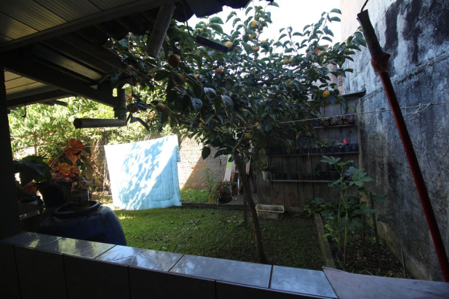 Imagem Casa com 4 Quartos à Venda, 131 m² em Uberaba - Curitiba