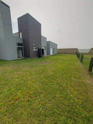 Imagem Casa com 4 Quartos à Venda, 600 m² em Atlântida Sul - Osório