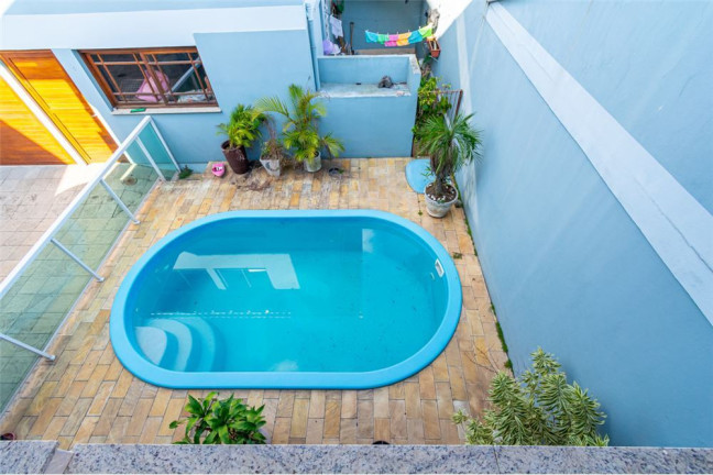 Imagem Casa com 4 Quartos à Venda,  em Moinhos De Vento - Canoas