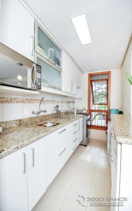 Imagem Apartamento com 2 Quartos à Venda, 82 m² em Jardim Botânico - Porto Alegre