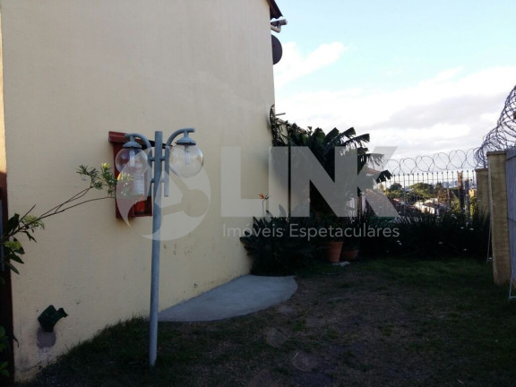 Imagem Casa com 2 Quartos à Venda, 36 m² em Santo Antônio - Porto Alegre Imagem Casa com 2 Quartos à Venda, 36 m² em Santo Antônio - Porto Alegre