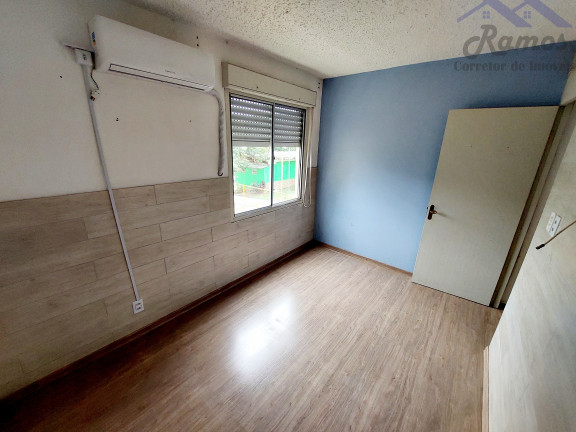 Imagem Imóvel com 2 Quartos à Venda, 50 m² em Vila Nova - Porto Alegre