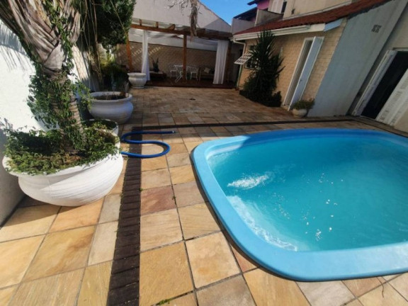 Imagem Casa com 3 Quartos à Venda, 276 m² em Jardim Itu - Porto Alegre