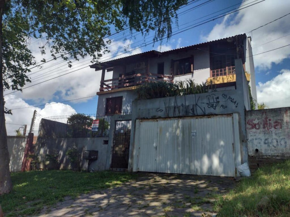Imagem Casa com 4 Quartos à Venda, 238 m² em Cristal - Porto Alegre