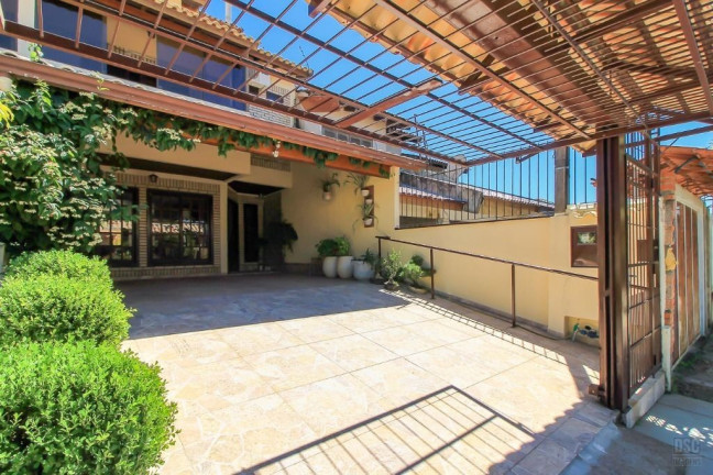 Imagem Casa com 3 Quartos à Venda, 198 m² em Cavalhada - Porto Alegre