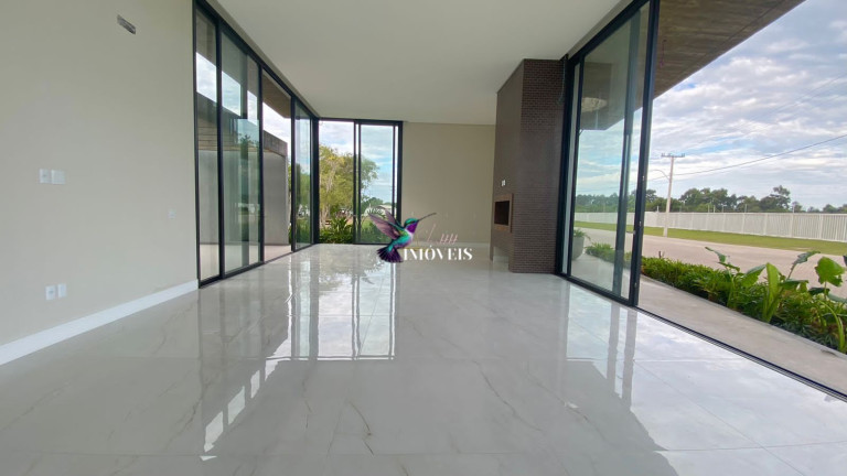 Imagem Casa de Condomínio com 4 Quartos à Venda, 324 m² em Centro - Capão Da Canoa