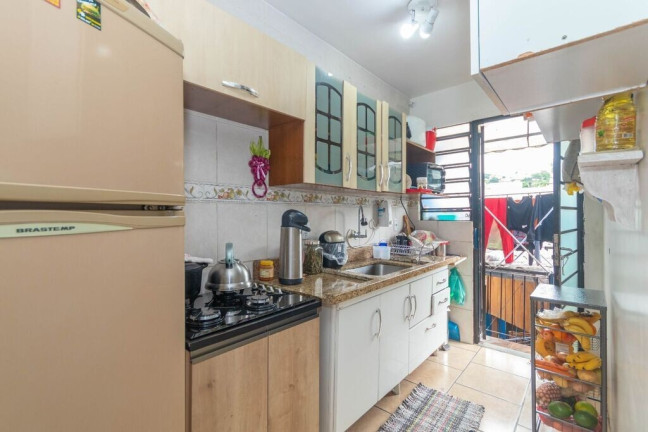 Imagem Casa com 3 Quartos à Venda, 174 m² em Nonoai - Porto Alegre