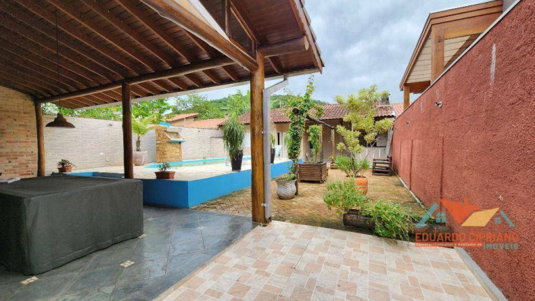 Imagem Casa com 4 Quartos à Venda, 239 m² em Massaguaçu - Caraguatatuba