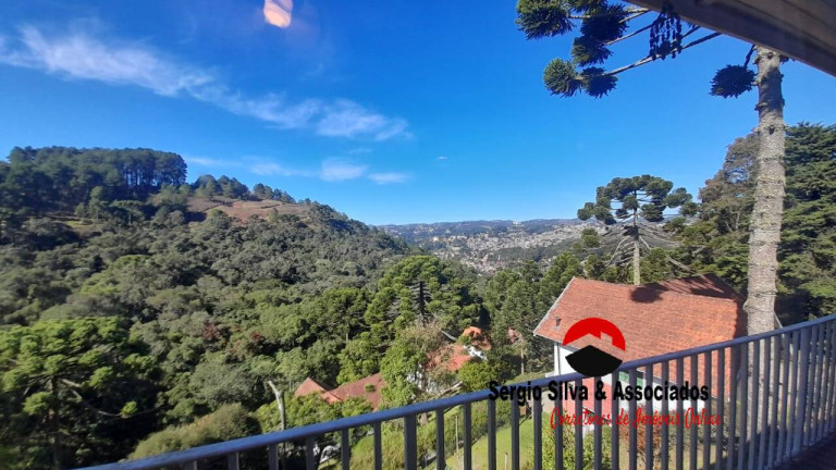 Imagem Casa de Condomínio com 4 Quartos à Venda, 2 m² em Vale Encantado - Campos Do Jordão