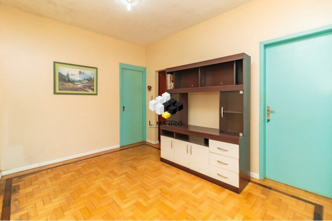Imagem Casa com 3 Quartos à Venda, 195 m² em Santa Maria Goretti - Porto Alegre Imagem Casa com 3 Quartos à Venda, 195 m² em Santa Maria Goretti - Porto Alegre