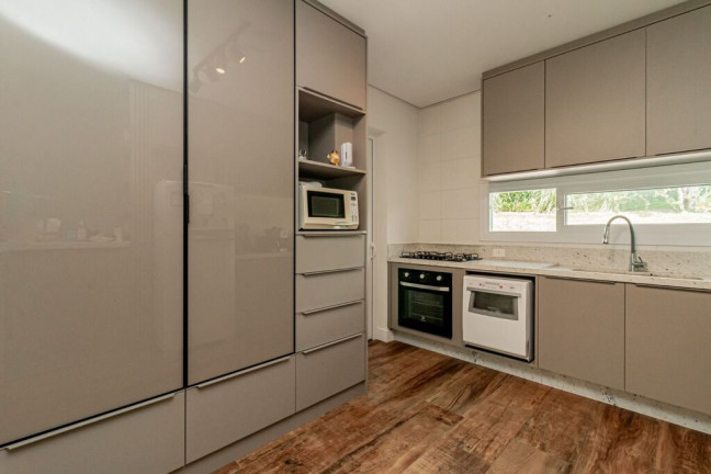 Imagem Casa de Condomínio com 3 Quartos à Venda, 438 m² em Pedra Redonda - Porto Alegre
