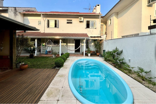 Imagem Casa com 4 Quartos à Venda, 243 m² em Moinhos De Vento - Canoas