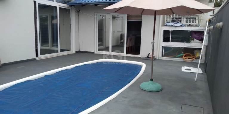 Imagem Casa de Condomínio com 4 Quartos à Venda, 380 m² em Ipanema - Porto Alegre