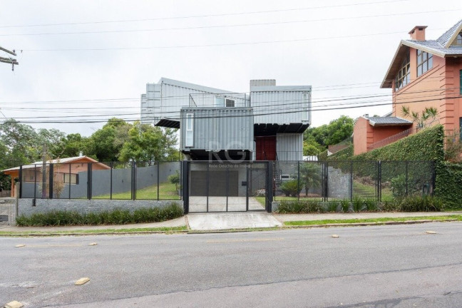 Imagem Casa com 3 Quartos à Venda, 333 m² em Teresópolis - Porto Alegre