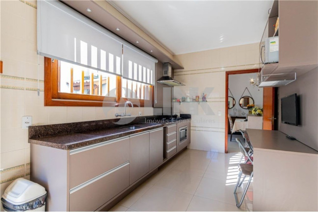 Imagem Casa com 4 Quartos à Venda,  em Jardim Itu - Porto Alegre