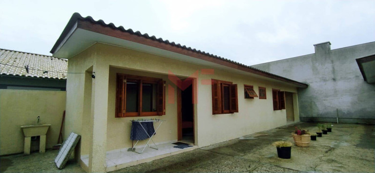 Imagem Casa com 5 Quartos à Venda, 180 m²em Capão Da Canoa - Capão Da Canoa