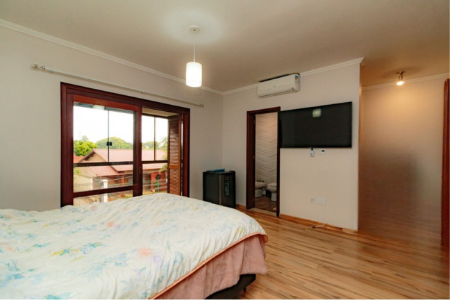 Imagem Casa com 3 Quartos à Venda, 235 m² em Sarandi - Porto Alegre