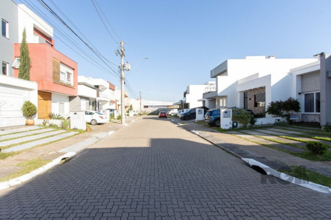 Imagem Casa de Condomínio com 3 Quartos à Venda, 112 m² em Hípica - Porto Alegre