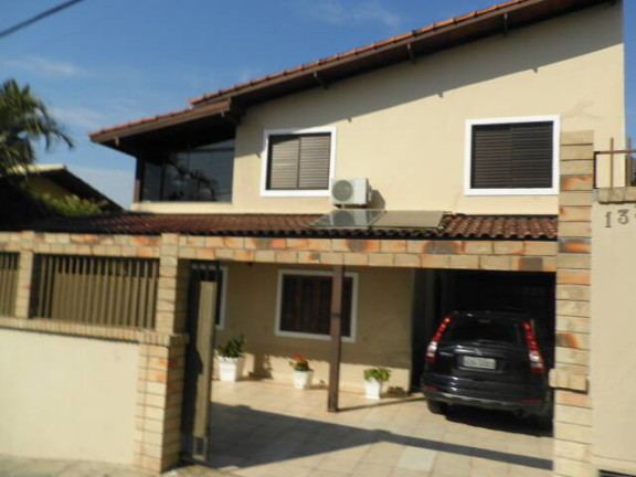 Casa com 4 Quartos à Venda, 256 m² em Santinho - Florianópolis