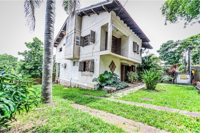 Imagem Casa de Condomínio com 4 Quartos à Venda, 231 m² em Santa Tereza - Porto Alegre Imagem Casa de Condomínio com 4 Quartos à Venda, 231 m² em Santa Tereza - Porto Alegre