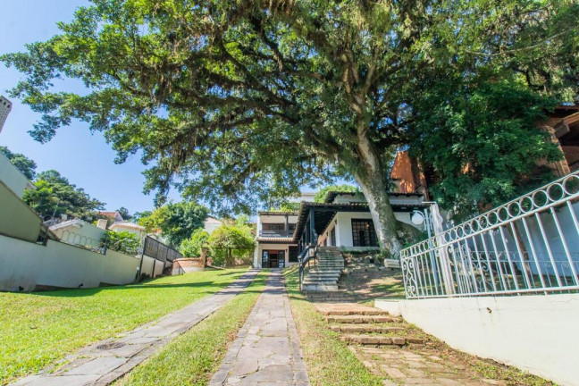 Imagem Casa com 4 Quartos à Venda, 348 m² em Ipanema - Porto Alegre