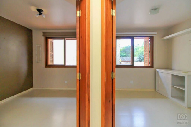 Imagem Casa de Condomínio com 3 Quartos à Venda, 138 m² em Ipanema - Porto Alegre