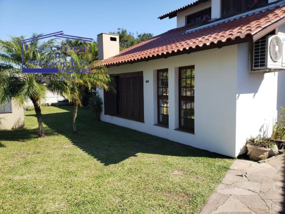 Casa com 4 Quartos à Venda, 268 m² em Cavalhada - Porto Alegre