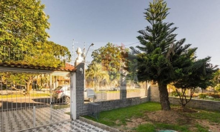 Imagem Casa com 5 Quartos à Venda, 243 m² em Hípica - Porto Alegre Imagem Casa com 5 Quartos à Venda, 243 m² em Hípica - Porto Alegre