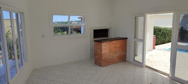 Imagem Casa com 3 Quartos à Venda, 310 m² em Vila Nova - Porto Alegre