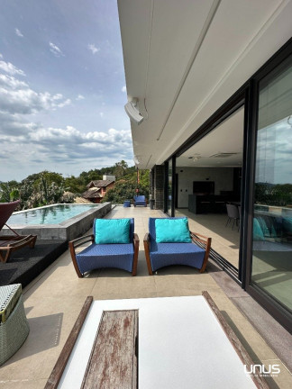 Imagem Casa de Condomínio com 3 Quartos à Venda, 510 m² em Cacupé - Florianópolis