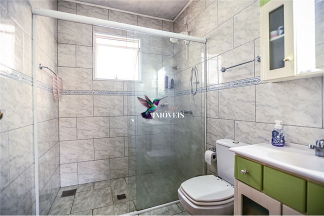 Imagem Casa com 2 Quartos à Venda, 149 m² em Passo Da Areia - Porto Alegre