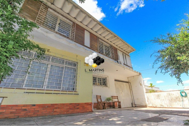 Imagem Casa com 5 Quartos à Venda, 254 m² em Três Figueiras - Porto Alegre