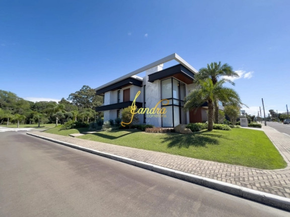 Imagem Casa de Condomínio com 6 Quartos à Venda, 588 m² em Zona Nova - Capão Da Canoa