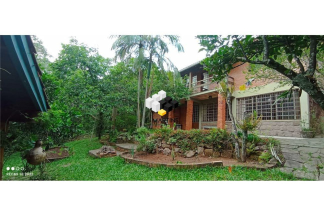 Imagem Casa com 2 Quartos à Venda, 210 m² em Vila Nova - Porto Alegre Imagem Casa com 2 Quartos à Venda, 210 m² em Vila Nova - Porto Alegre