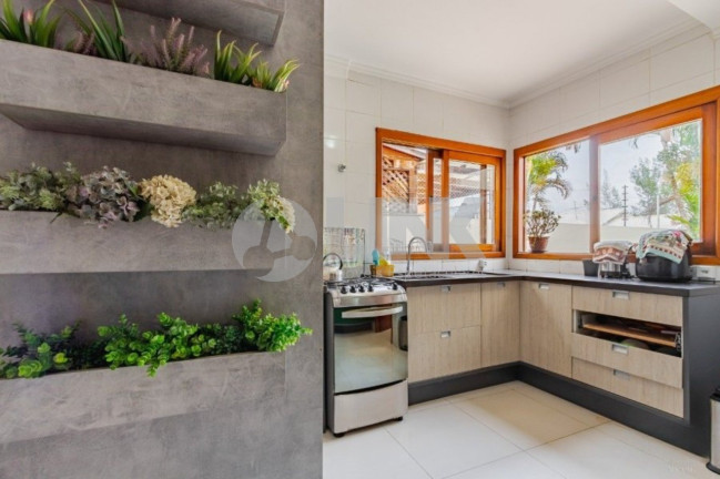 Imagem Casa com 3 Quartos à Venda, 231 m² em Jardim Itu - Porto Alegre