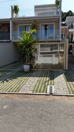 Imagem Sobrado com 3 Quartos à Venda, 205 m² em Jardim Das Américas - Curitiba