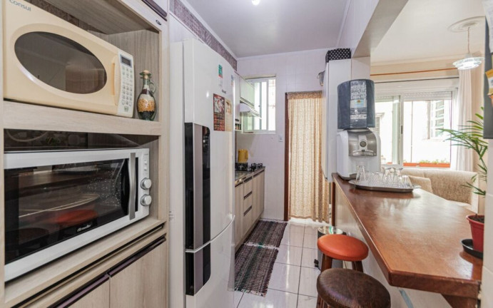 Imagem Imóvel com 2 Quartos à Venda, 57 m² em Menino Deus - Porto Alegre Imagem Imóvel com 2 Quartos à Venda, 57 m² em Menino Deus - Porto Alegre
