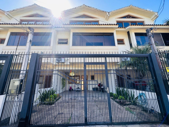 Imagem Casa com 3 Quartos à Venda, 215 m² em Hípica - Porto Alegre Imagem Casa com 3 Quartos à Venda, 215 m² em Hípica - Porto Alegre