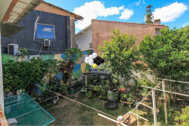 Imagem Casa com 5 Quartos à Venda, 254 m² em Três Figueiras - Porto Alegre