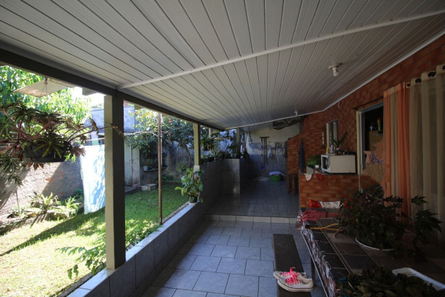 Imagem Casa com 4 Quartos à Venda, 131 m² em Uberaba - Curitiba