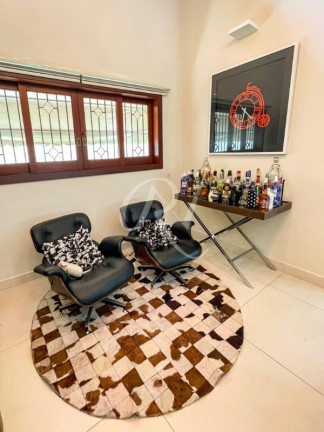 Imagem Sobrado com 4 Quartos à Venda, 460 m² em Indaiá - Caraguatatuba