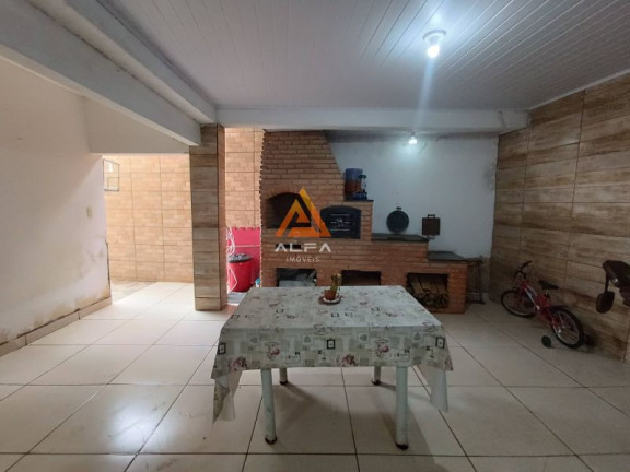 Imagem Casa com 4 Quartos à Venda, 240 m²