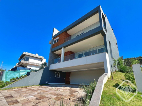 Imagem Casa de Condomínio com 4 Quartos à Venda, 375 m² em Alphaville - Porto Alegre