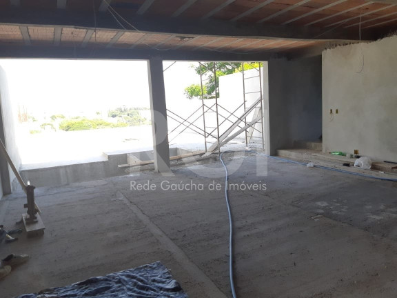 Imagem Casa com 3 Quartos à Venda, 290 m² em Santo Antônio - Porto Alegre