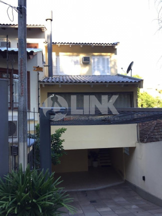 Imagem Casa com 2 Quartos à Venda, 131 m² em Cristo Redentor - Porto Alegre
