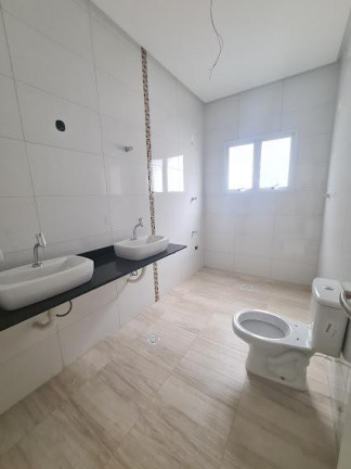 Imagem Casa com 4 Quartos à Venda, 215 m² em Canto Do Forte - Praia Grande
