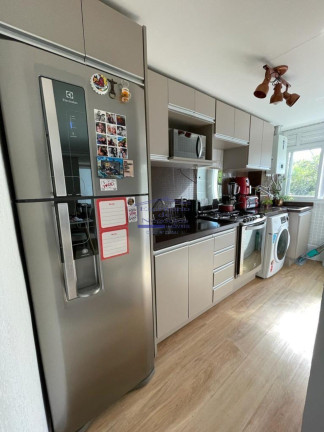Imagem Imóvel com 2 Quartos à Venda, 49 m² em Vila Nova - Porto Alegre Imagem Imóvel com 2 Quartos à Venda, 49 m² em Vila Nova - Porto Alegre