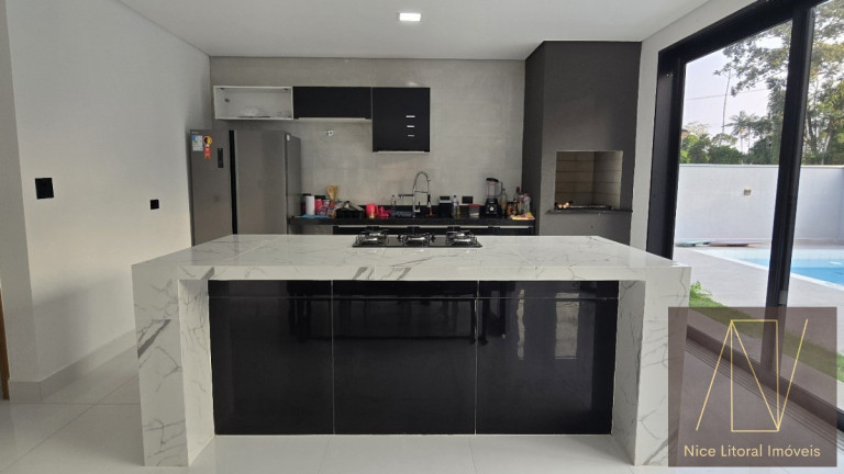 Imagem Sobrado com 4 Quartos à Venda, 300 m² em Massaguaçu - Caraguatatuba